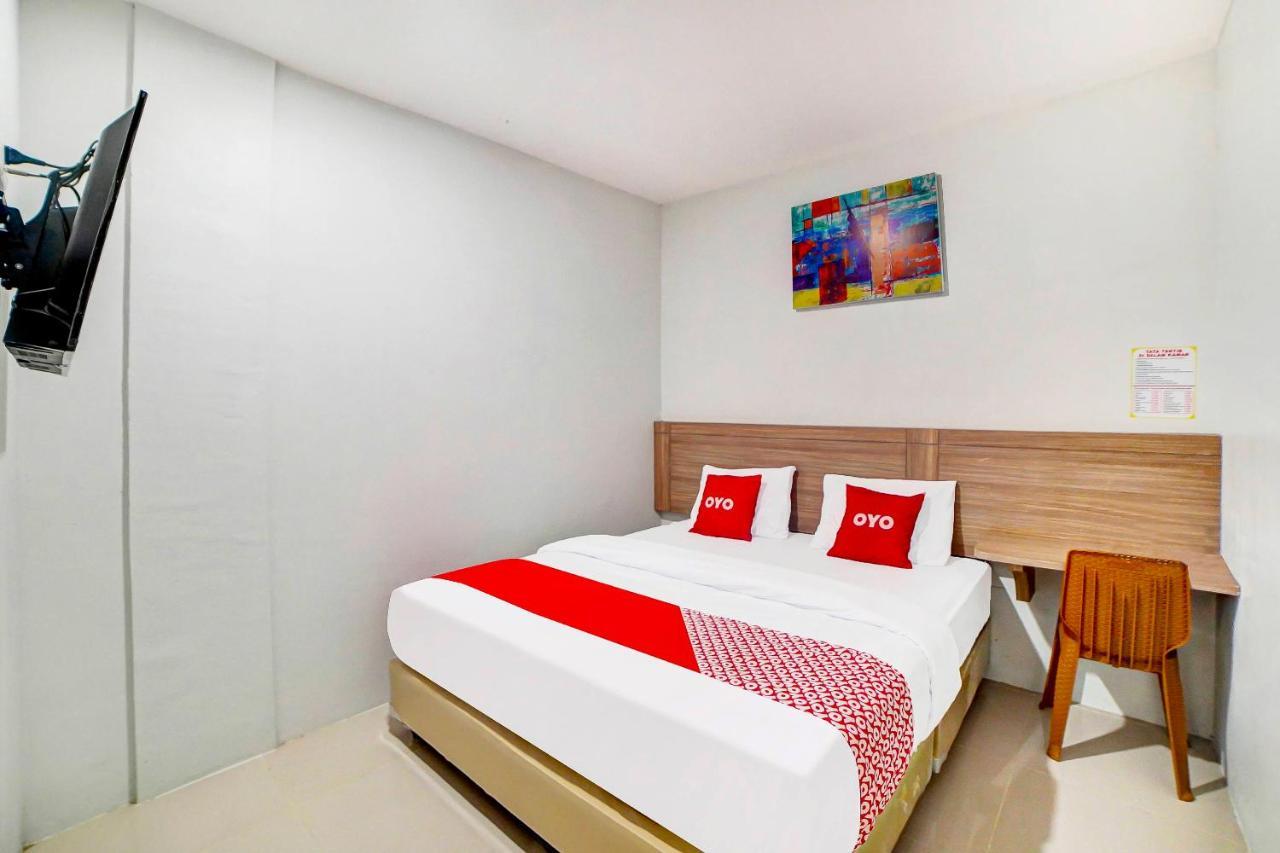 Oyo 91211 Mega Comfort Guest House Medan Exterior photo